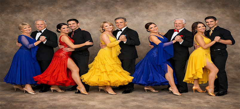 An image shows dancer in ball gowns 